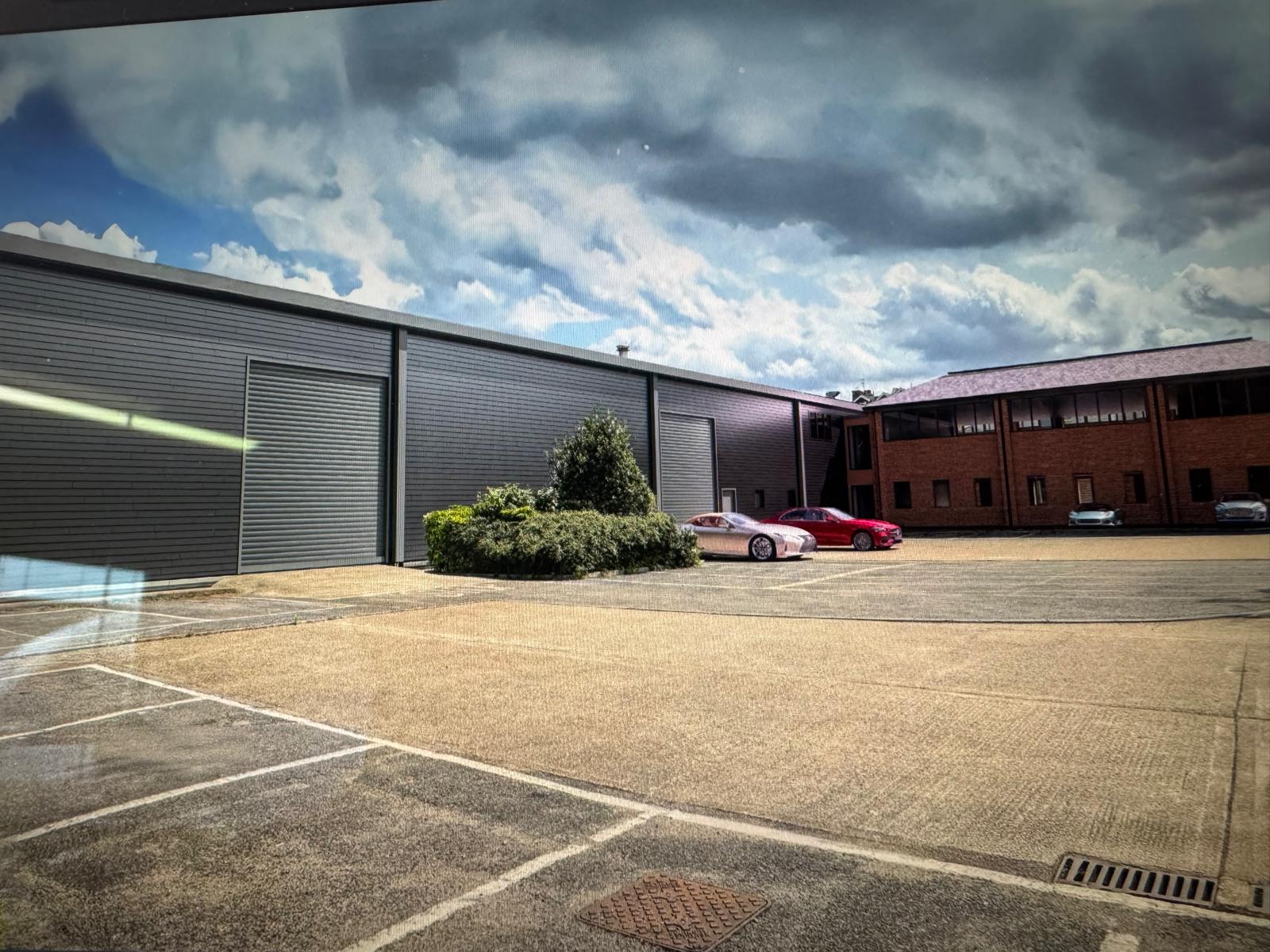 Industrial warehouse and yard showing cladding, roofing and flooring services by Anglia Decor