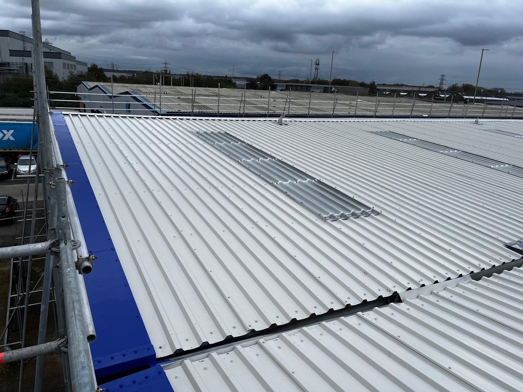 New Holland Tractor Plant, 8,000m² Asbestos Roof Replacement, completed by Anglia Decor