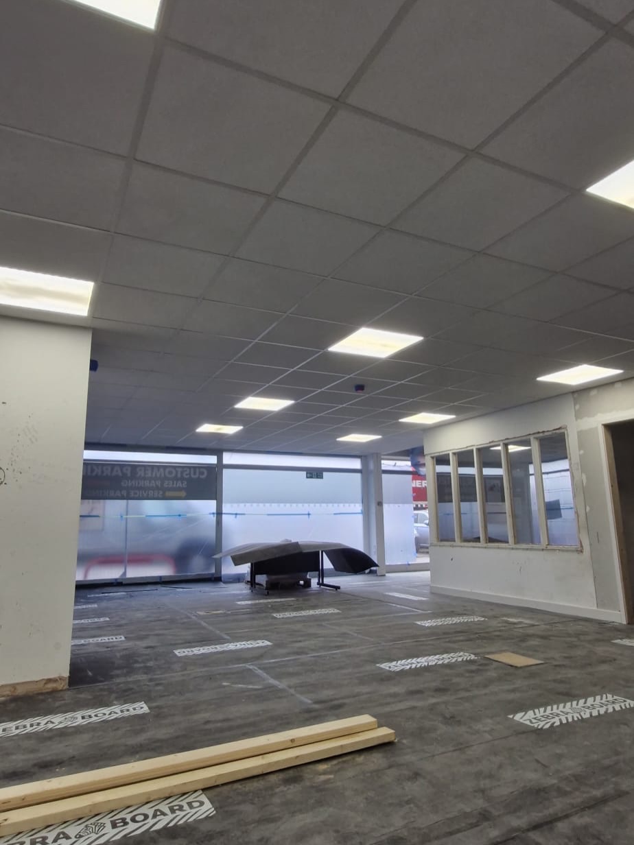Suspended Ceiling Spraying, Commercial Showroom Refresh, Painting & Spraying project by Anglia Decor