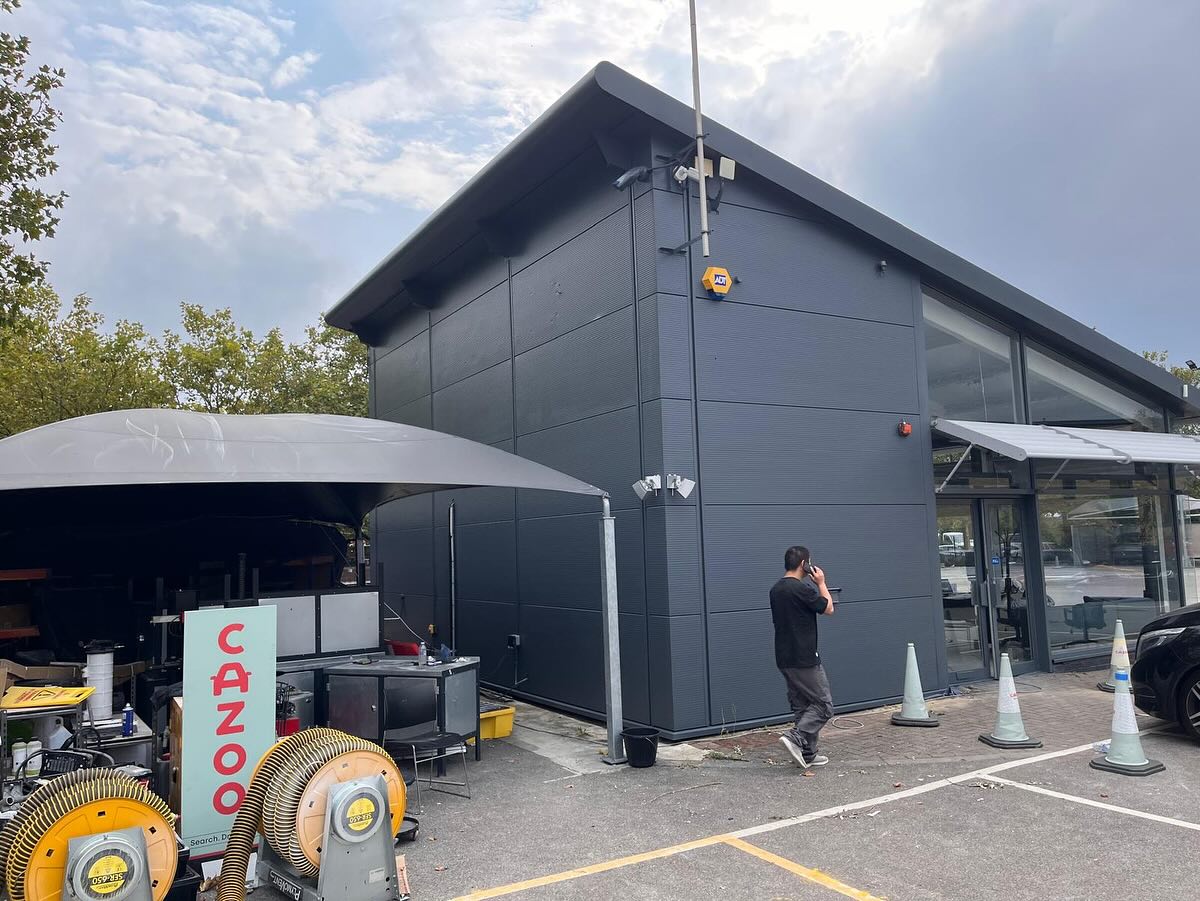 Wall cladding installation in progress