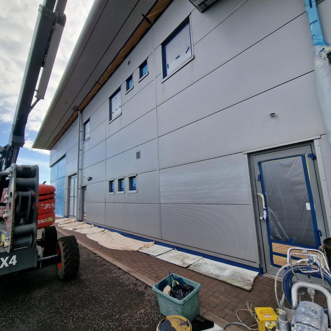 Overcladding application in progress