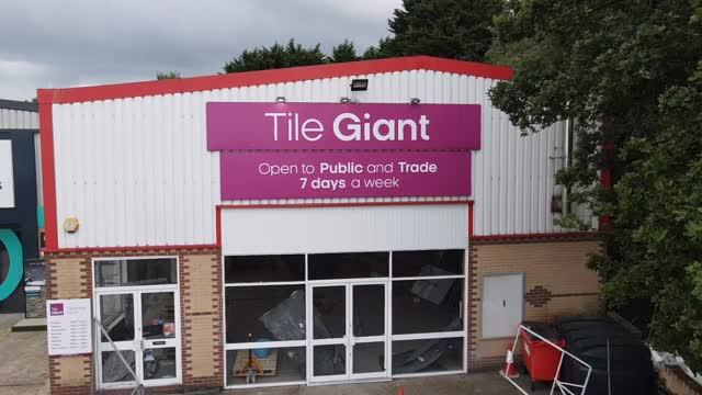 Sprayed shopfront with roller doors