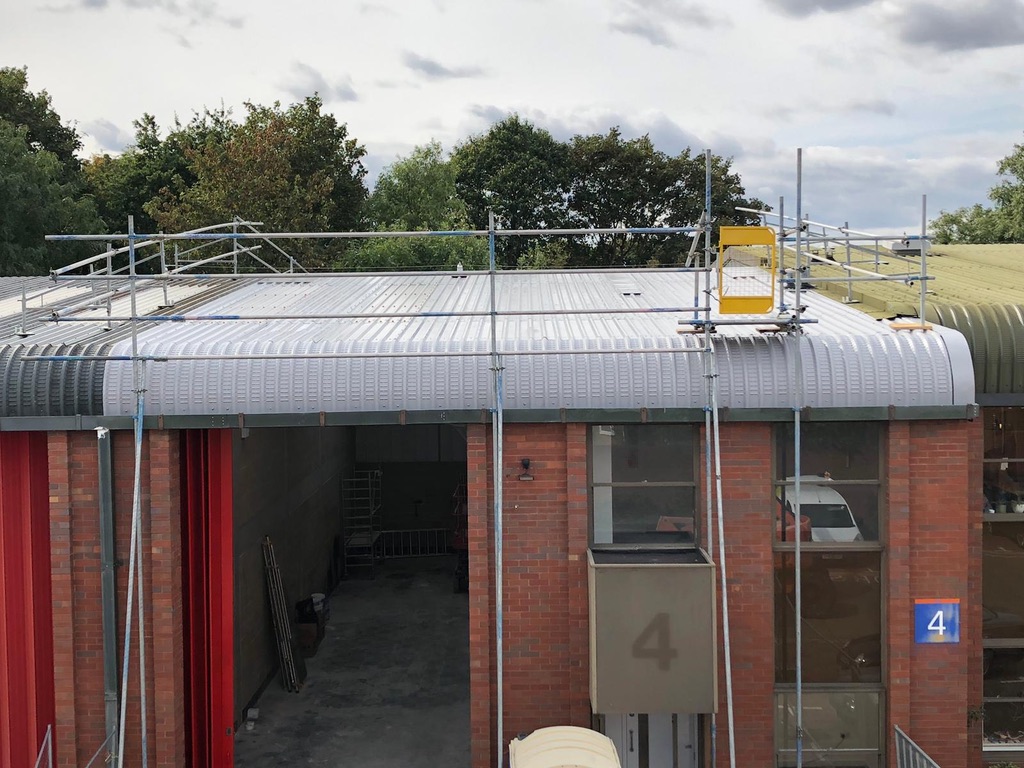 Metal roof on brick building