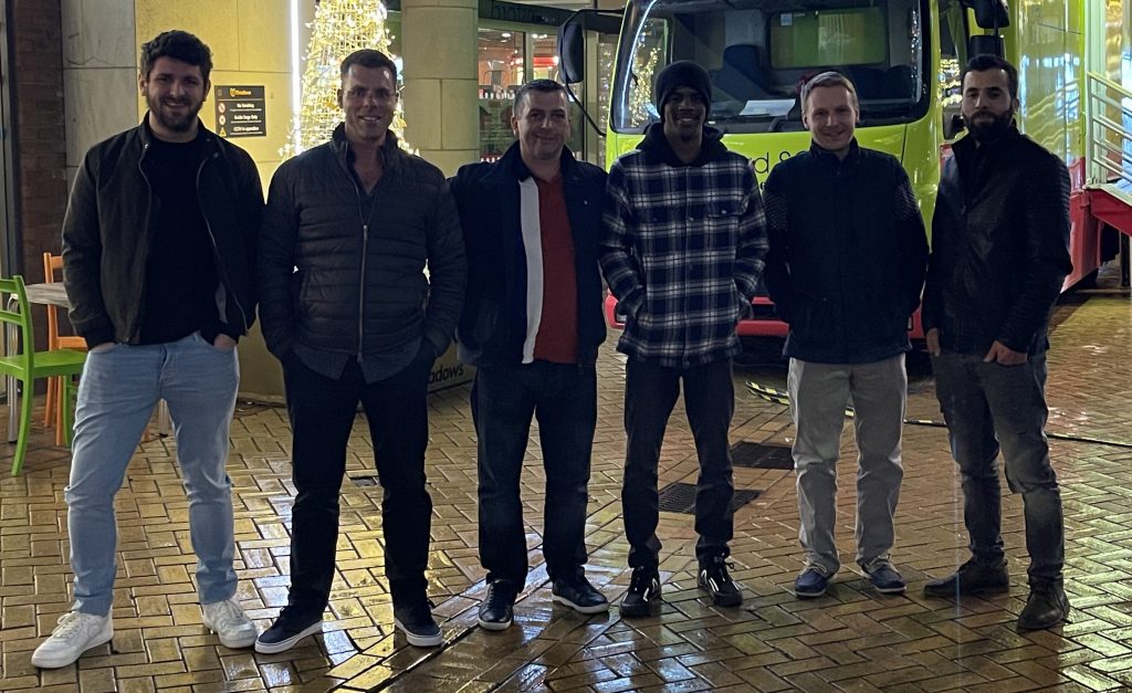 Anglia Decor team on an industrial painting and flooring project site